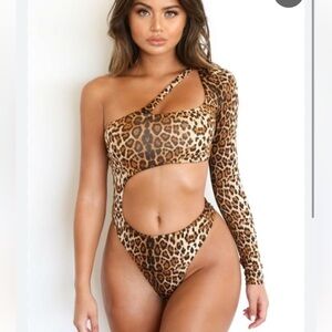 AM.GIA Jupiter leopard print asymmetrical long-sleeve bodysuit
